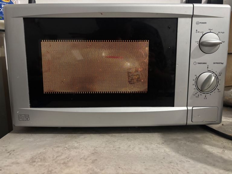 Compact Countertop Microwave Oven with Adjustable Power & Timer Controls