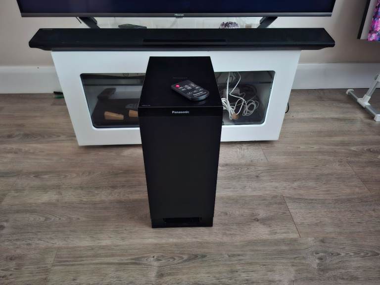 Panasonic black subwoofer & speaker  unit with remote control.