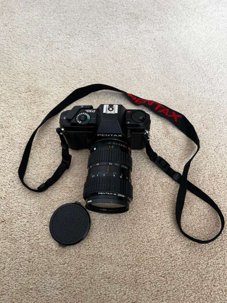 Pentax P30 SLR 35mm film camera with Pentax-A 28-80mm zoom lens