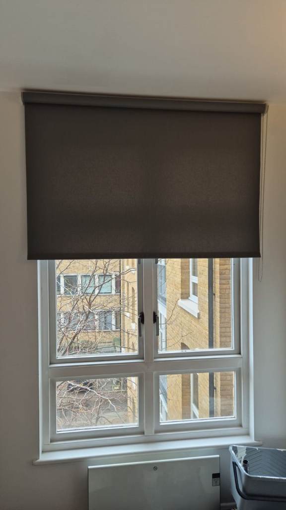 Grey roller blind