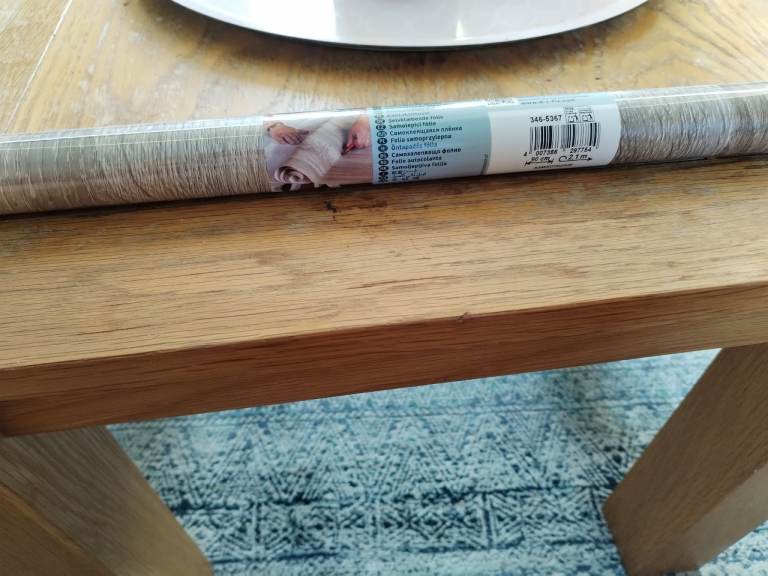 Kitchen worktop self adhesive overlay