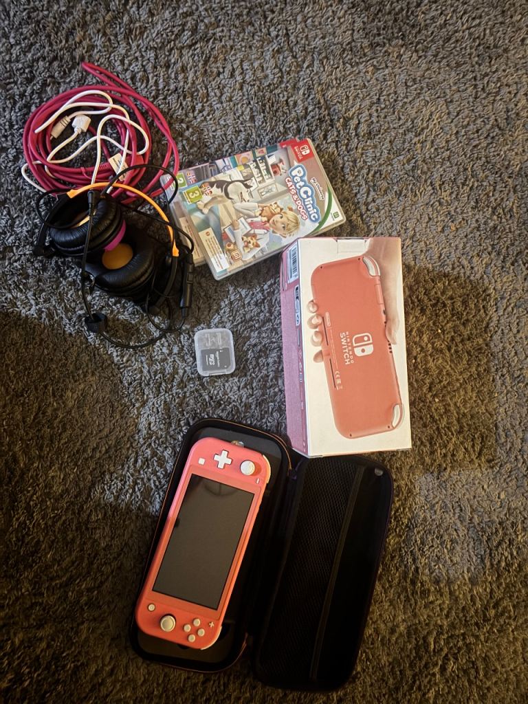 Nintendo switch lite coral pink used once 