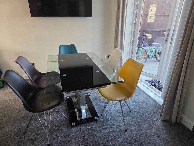 Modern Black Glass Dining Table with Chrome Legs & 5 multi colour chairs