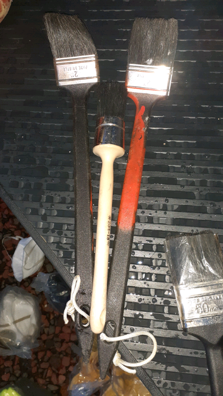 Paint brushes unused  2" and one round 