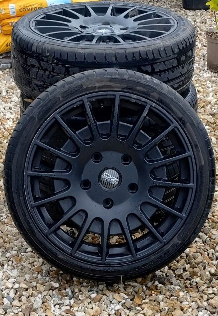 A set of 20 inch Black Alloys (OZ branded)