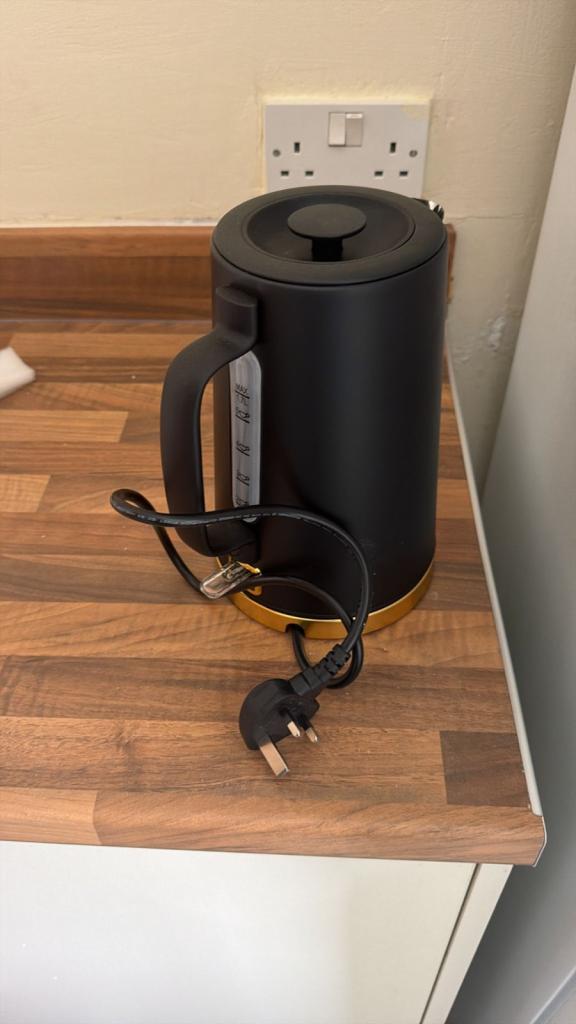 Stylish Black Kettle with Gold Trim – Good Condition
