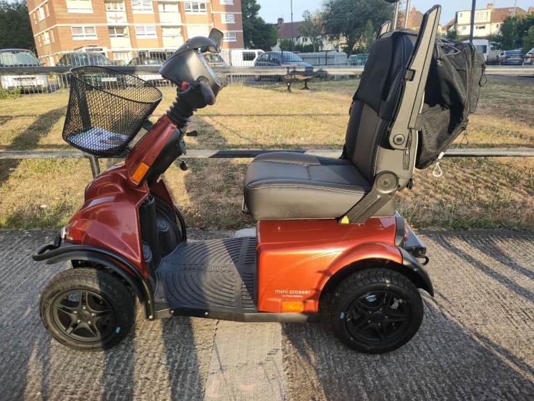 Mini crosser X 2. Mobility Scooter – Good Condition, Orange