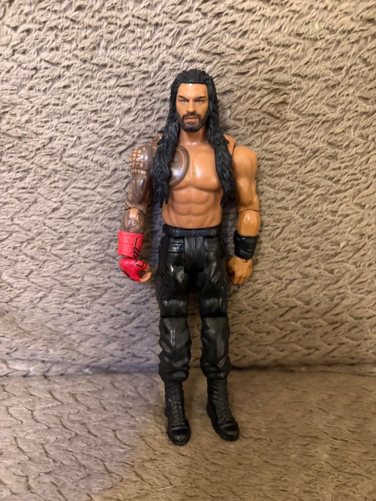 WWE Roman Reigns Action Figure – Good Condition