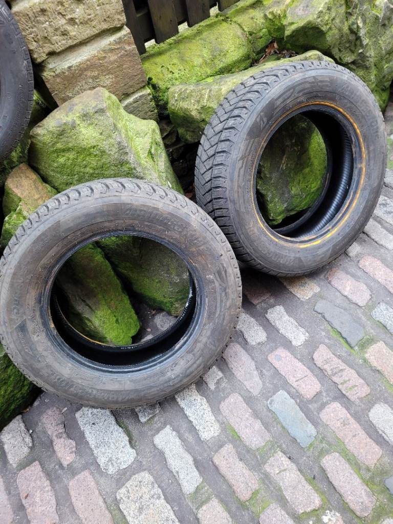 2x matching Bridgestone all season 215 65 16c as new tyres