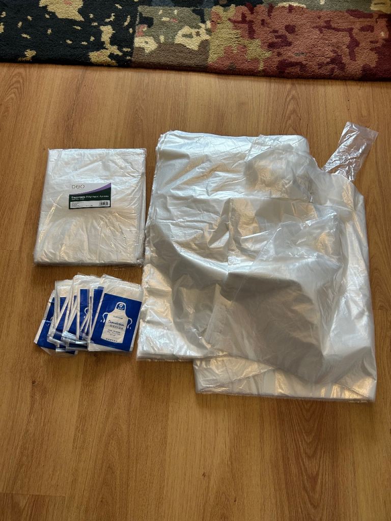 Disposable capes and aprons 