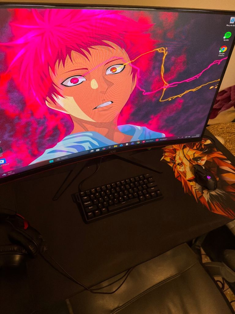 Gaming PC with Monitor and headset ready to go
