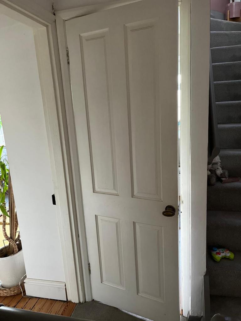 3 interior four panel wooden doors