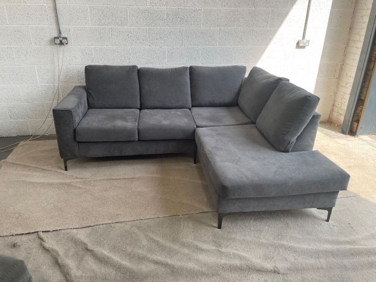 Comfortable Grey Corner Sofa with Chaise Lounge and Storage Ottoman