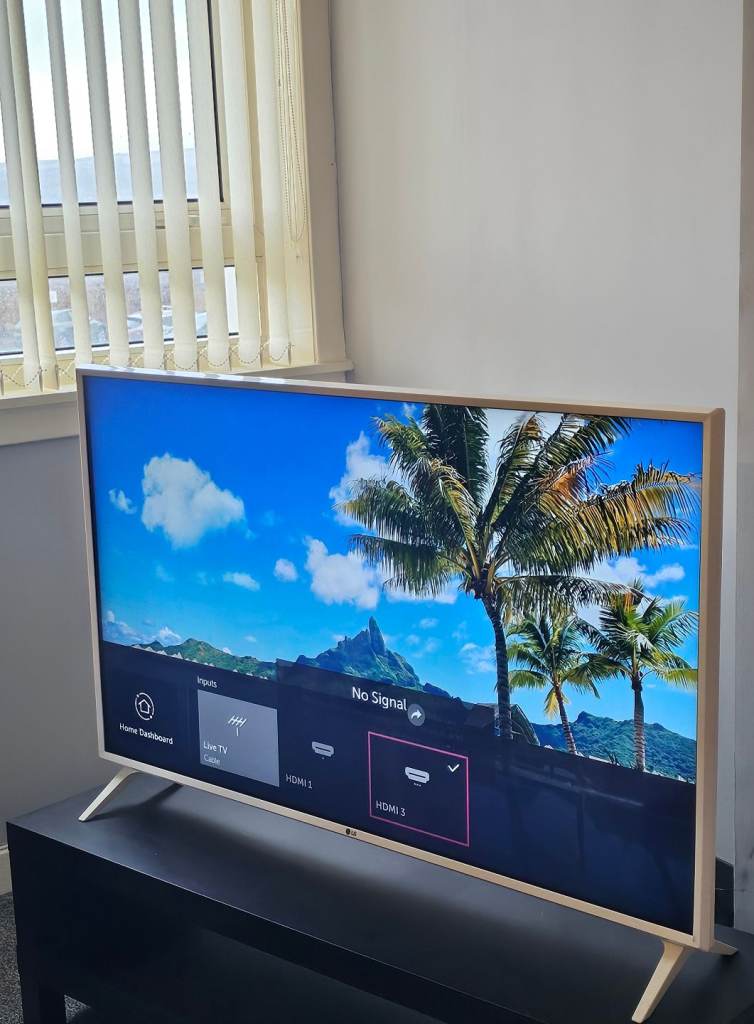 49" LG ULTRA HD 4K TV with Black TV unit,in Perfect Working Condition. 