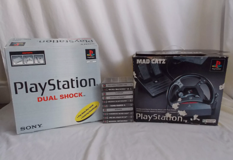 Sony PS1 Dual Shock Console BOXED + Mad Catz Steering Wheels + 10 Game Bundle