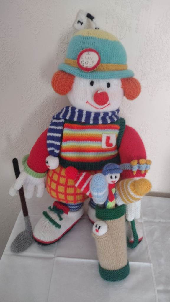 Hand knitted Christmas golfer