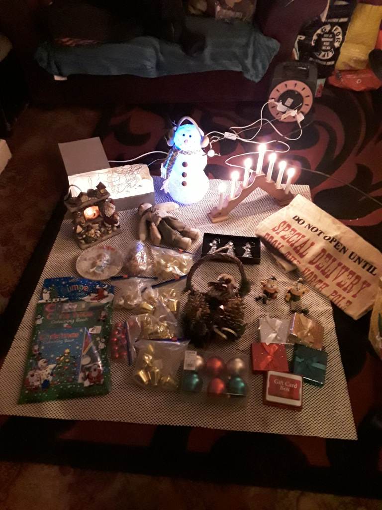 Christmas decorations/painted lights/flashing snowman/glass angels/baubles etc
