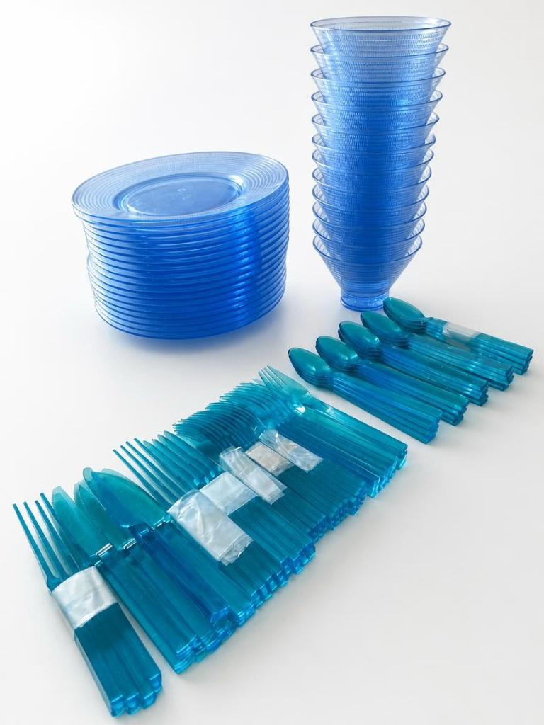 Large Set of Blue Acrylic/ Plexiglass Dinnerware and Cutlery