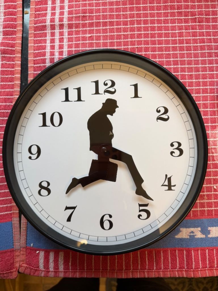 Novelty Wall Clock – Man Running, Good Condition