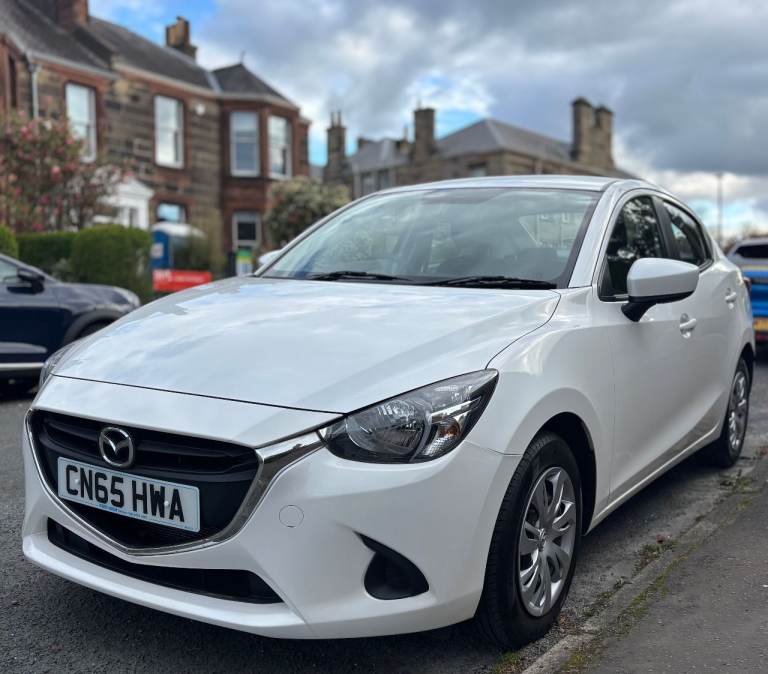 Superb Mazda 2 Neo (Saloon), very low mileage, drives impeccably