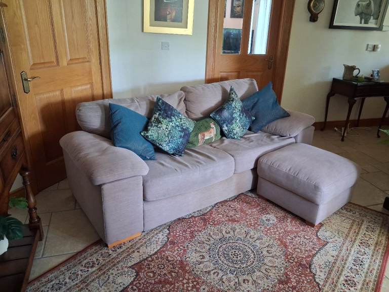 Sofa and foot stool.