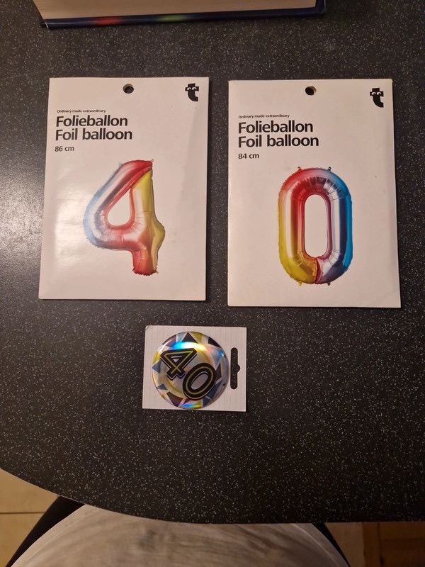 Birthday 40th balloons 🎈 and badge.