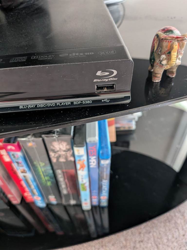 Blu-ray Disc Player and Film Collection – Good Condition