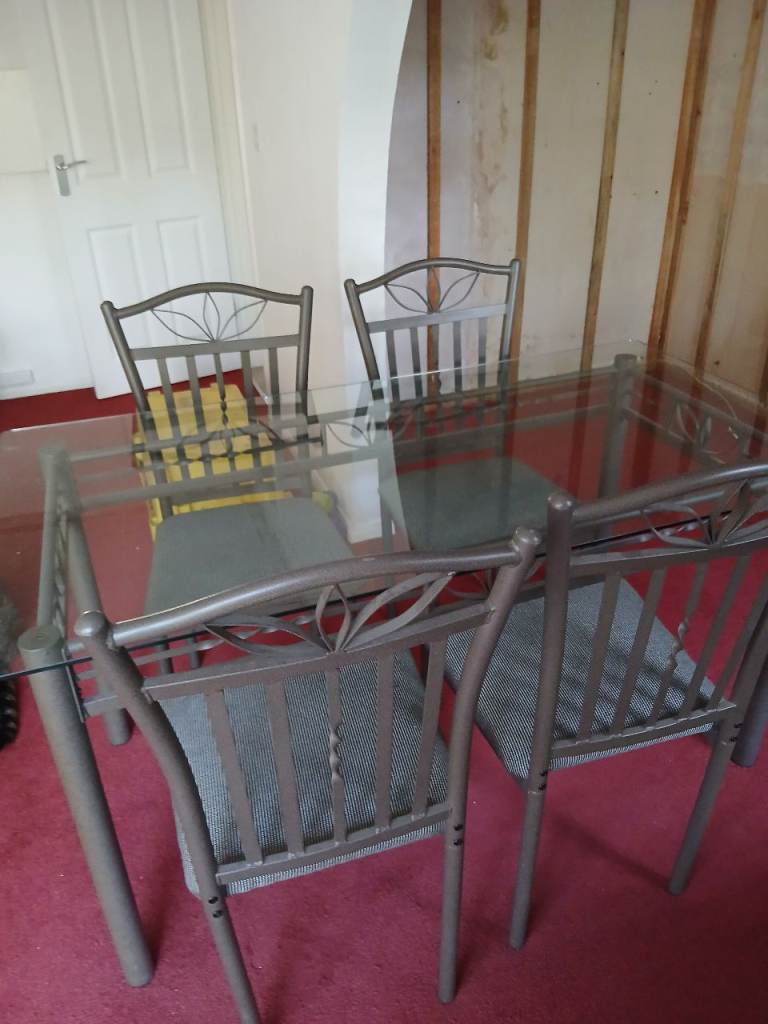 Glass Dining Table with 4 Metal Chairs – Good Condition