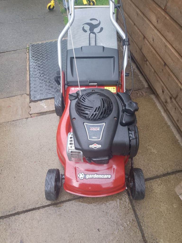 Garden care hand propelled petrol lawnmower with Briggs and Stratton engine 