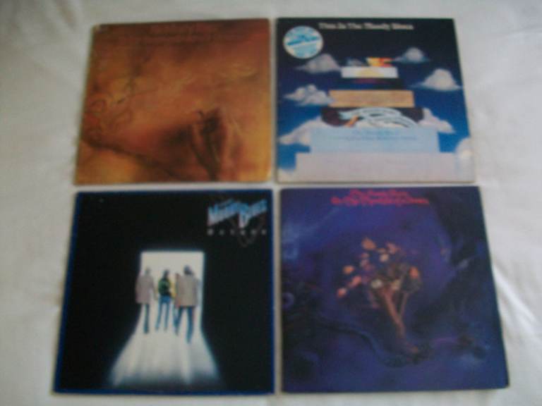 Four Moody Blues vinyl mono and stereo LP Record albums.