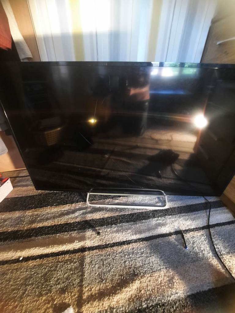 Sony 65" Flat Screen TV on stand. SPARES OR REPAIRS