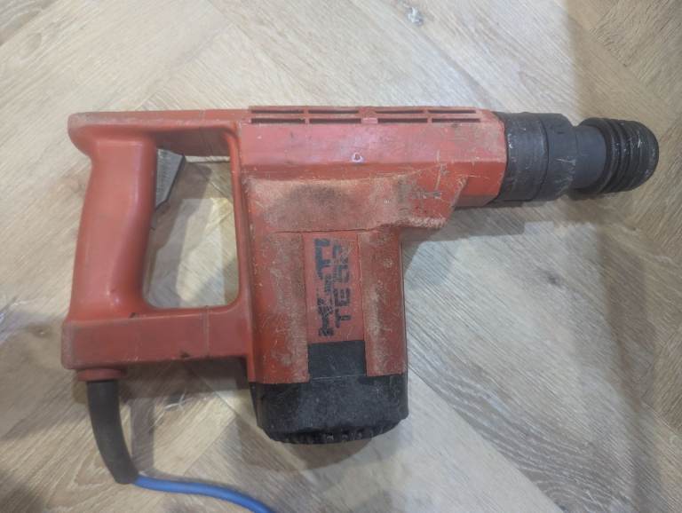 Reliable Hilti TE52 Breaker Drill comes with large drill bits  and case