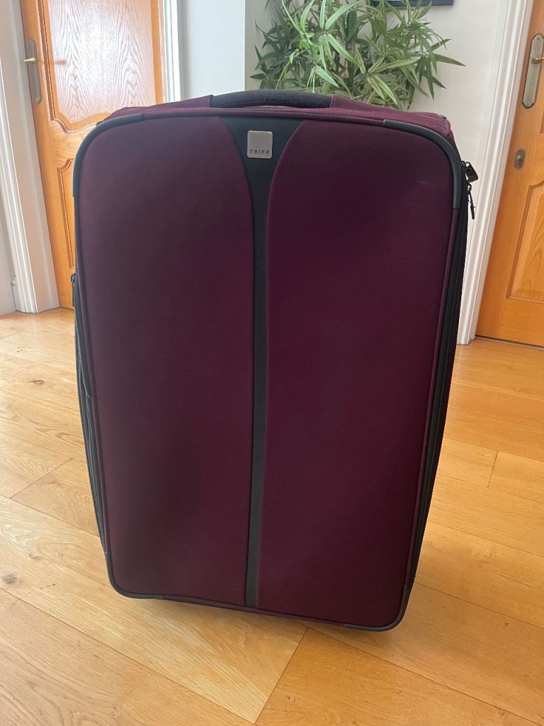 **Tripp Large Suitcase – burgundy, Good Condition**