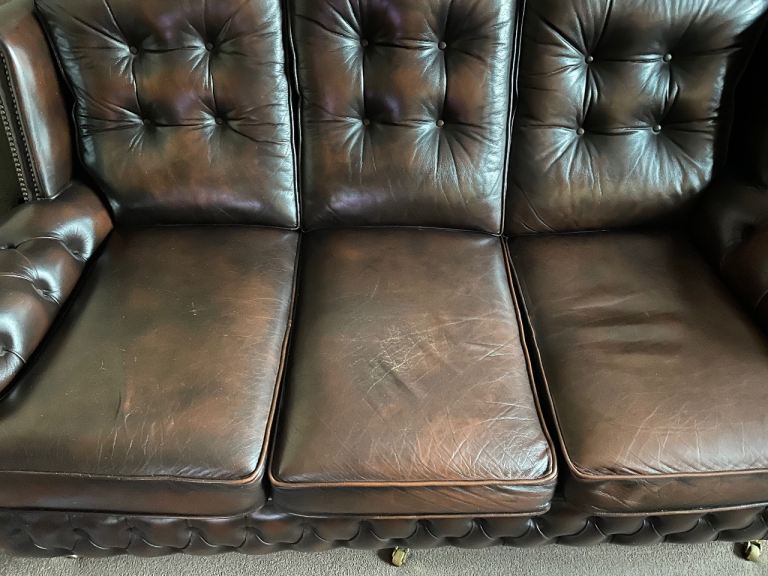Brown leather high back chesterfield sofa