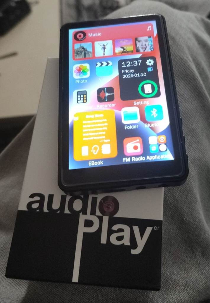 Audio MP3/MP4 4 inch touch screen player, brand new.