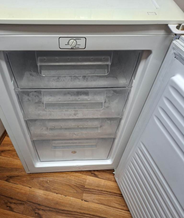 Freezer, undercunter in good condition and working order with scratch 