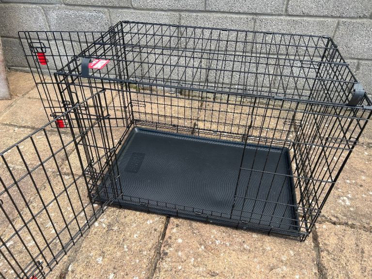 Kong dog crate with plastic tray, folds flat for storage