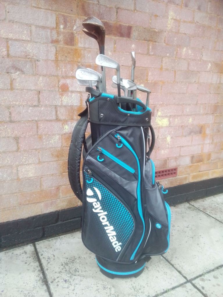 Gold clubs, bag a trolley 
