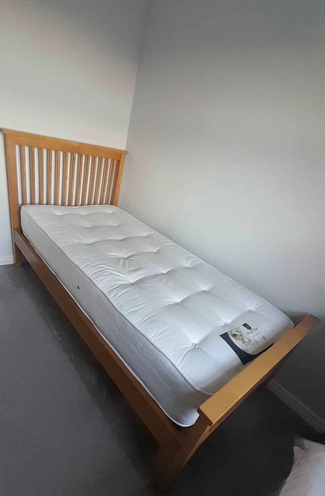 Wooden single bed with mattress 