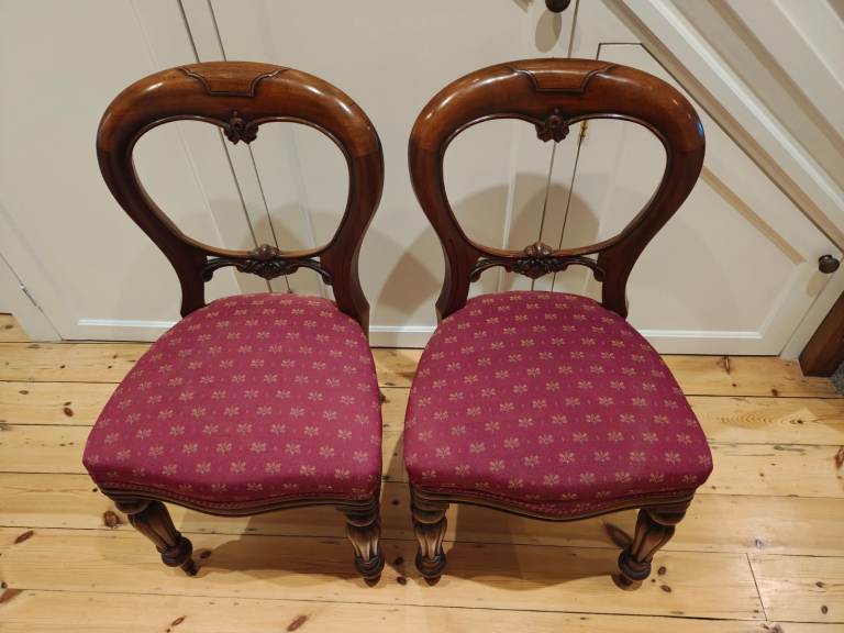 Two Mahogany Balloon Back Dining Chairs