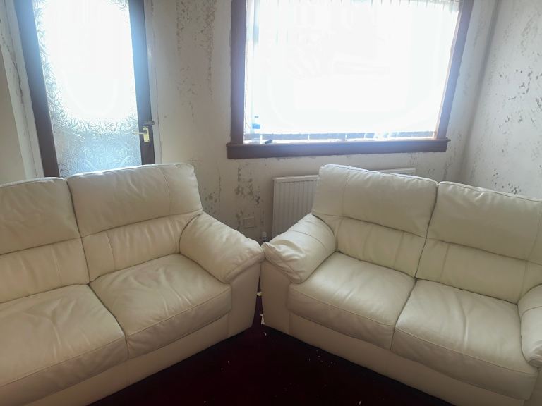 Two cream sofas 