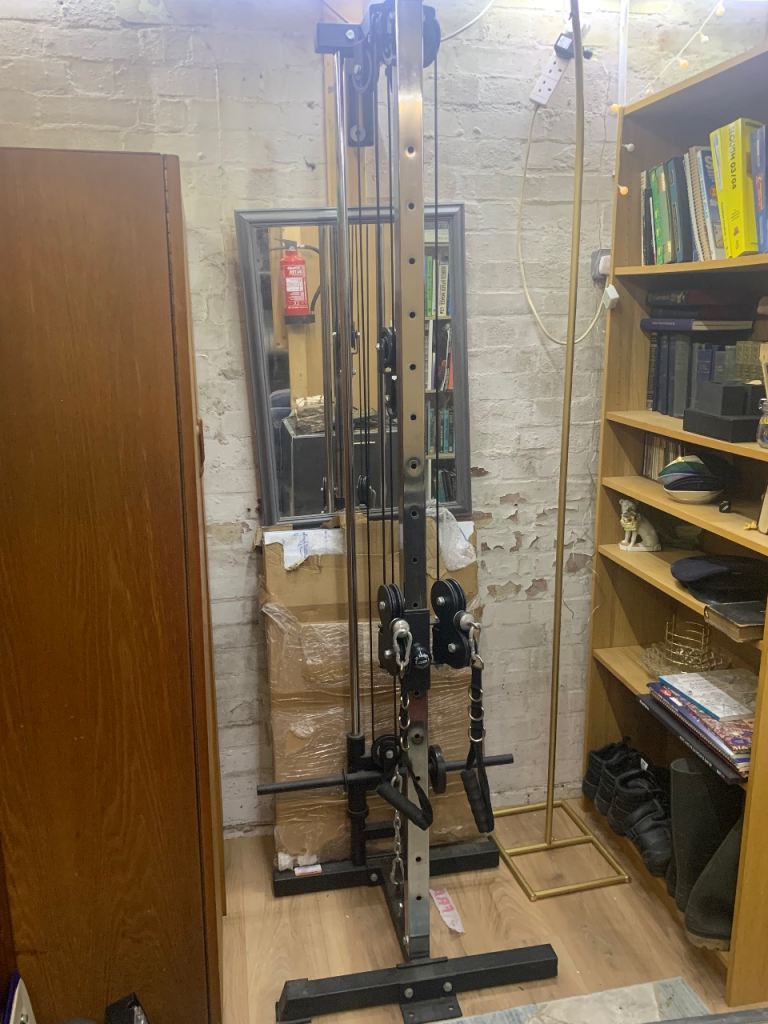 Cable machine with attachments 