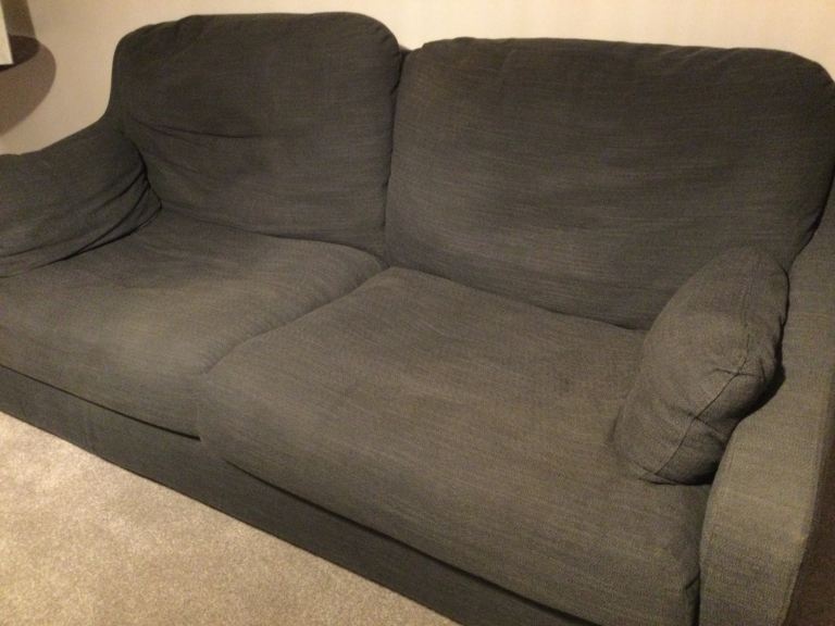 Dark grey three seater sofa