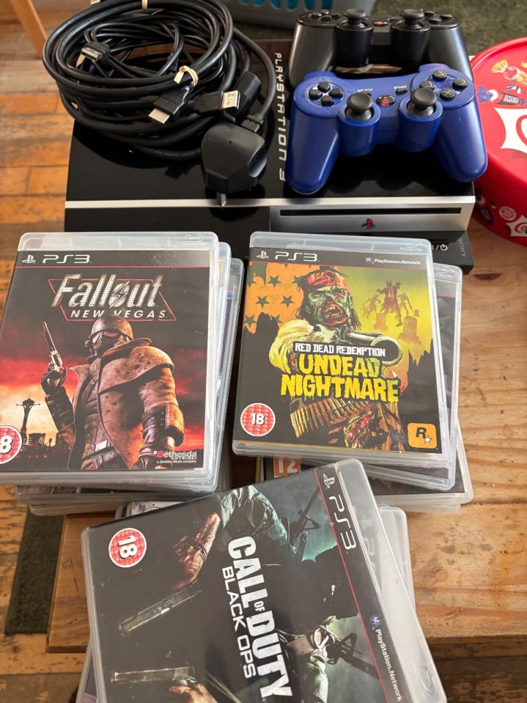 Playstaion 3 + 2 pads and 20 games
