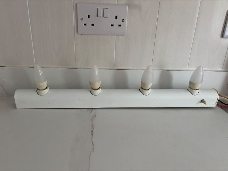 Four bulb bathroom light
