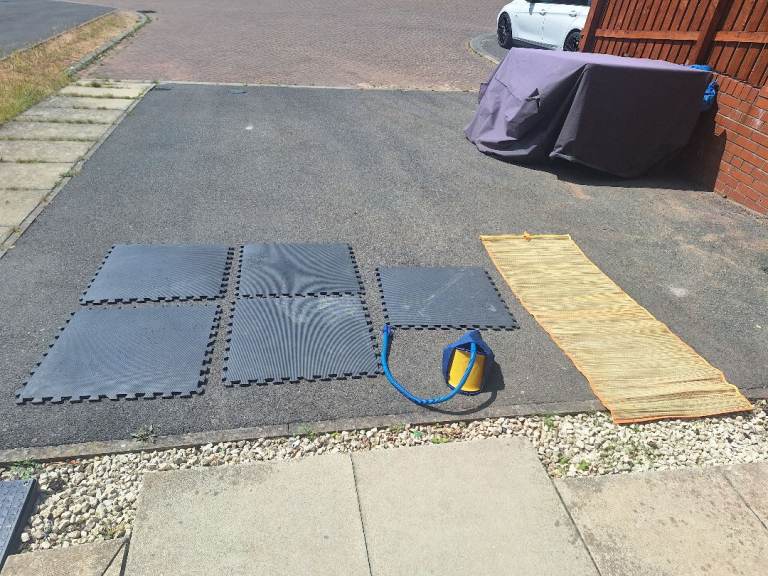A bundle of items mats and pump