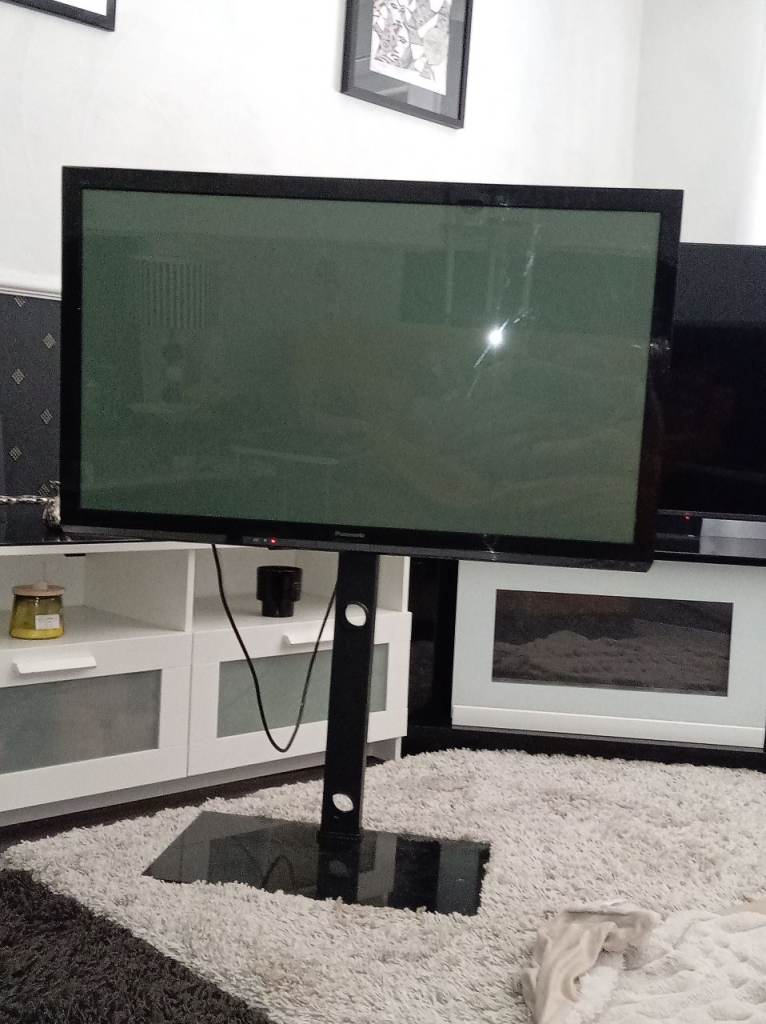 T V