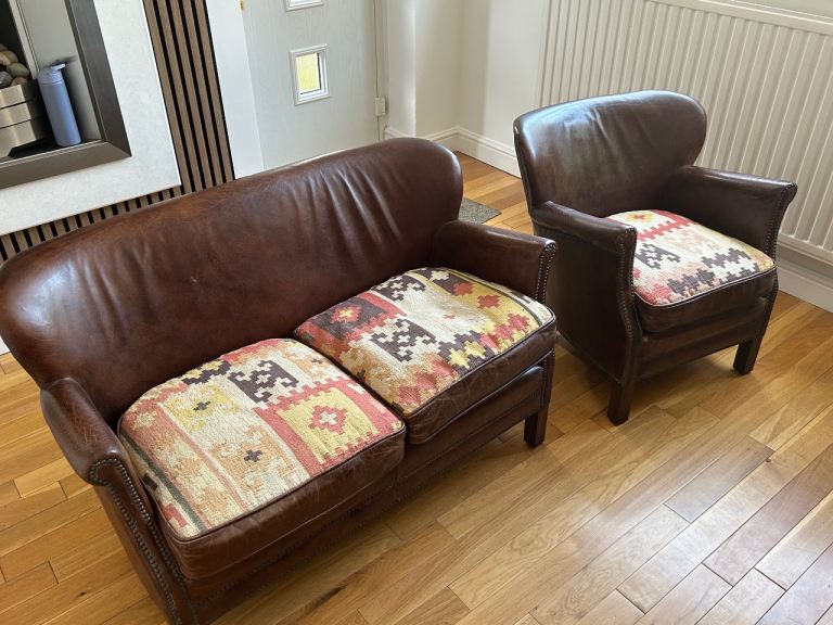 Small leather suite, 2 seater and a matching chair
