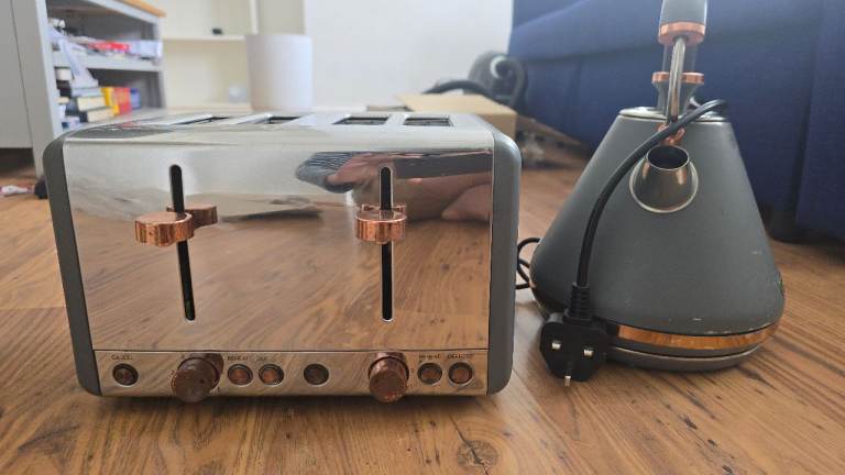 Grey Toaster with Copper Accents