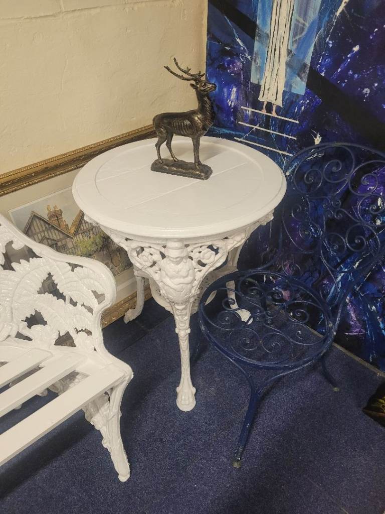 Victorian cast iron pub table Britannia pattern with cast iron garden chair 